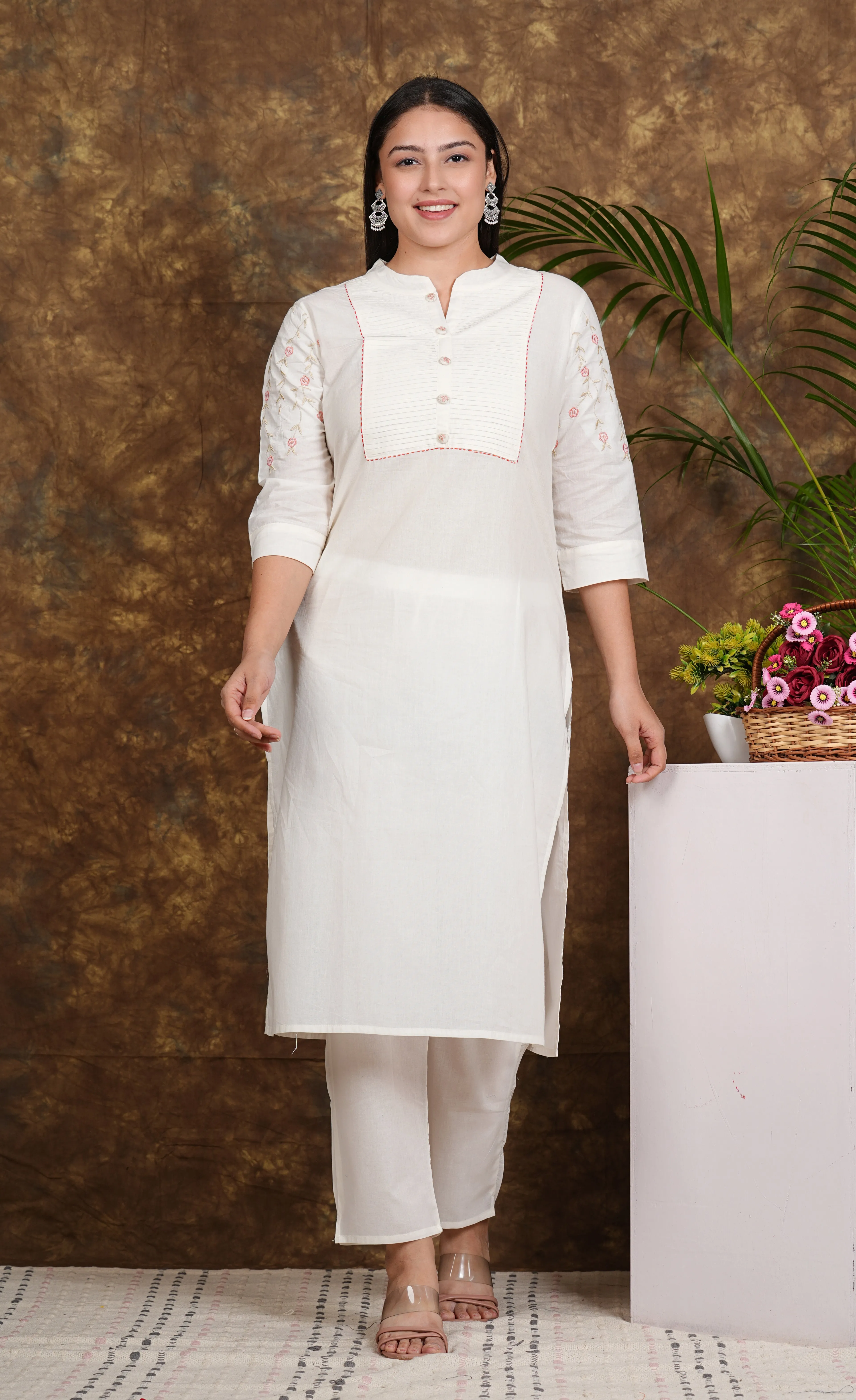 "Elegant Essence: Embroidered White Kurta & Pant Set"