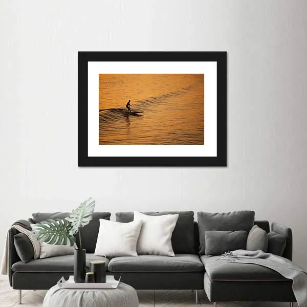 Single Surfer At Sunset On A Calm Ocean Canvas Wall Art