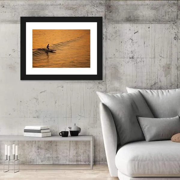 Single Surfer At Sunset On A Calm Ocean Canvas Wall Art