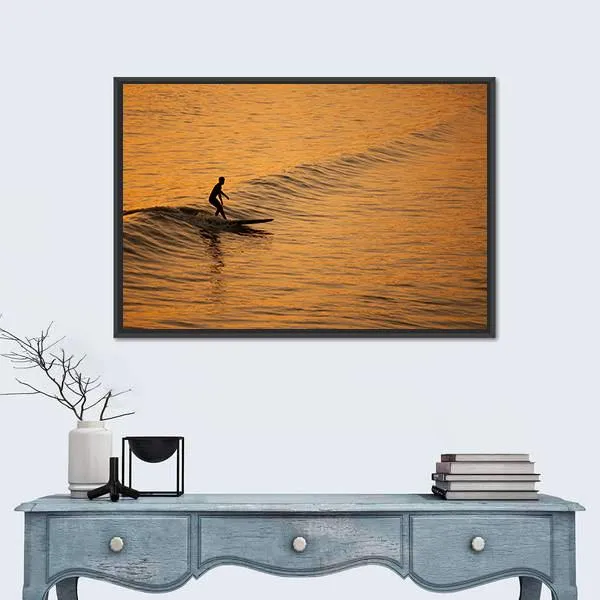 Single Surfer At Sunset On A Calm Ocean Canvas Wall Art