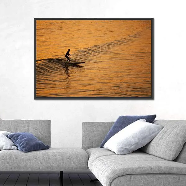 Single Surfer At Sunset On A Calm Ocean Canvas Wall Art