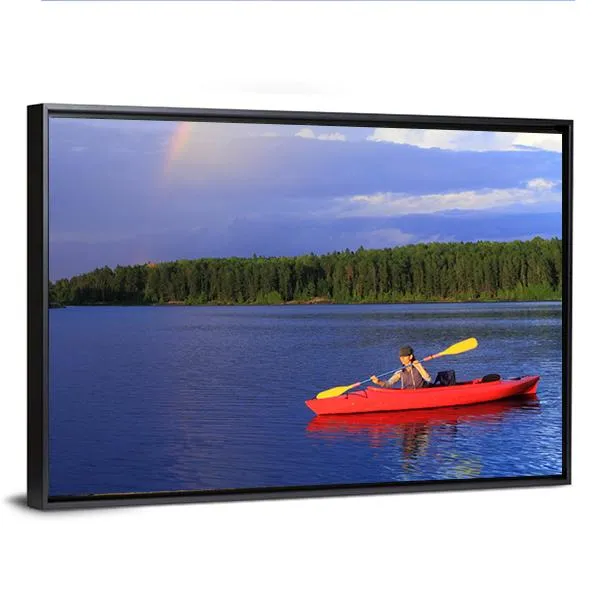 Woman Canoeing In A Beautiful Lake Canvas Wall Art