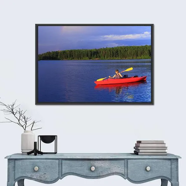 Woman Canoeing In A Beautiful Lake Canvas Wall Art