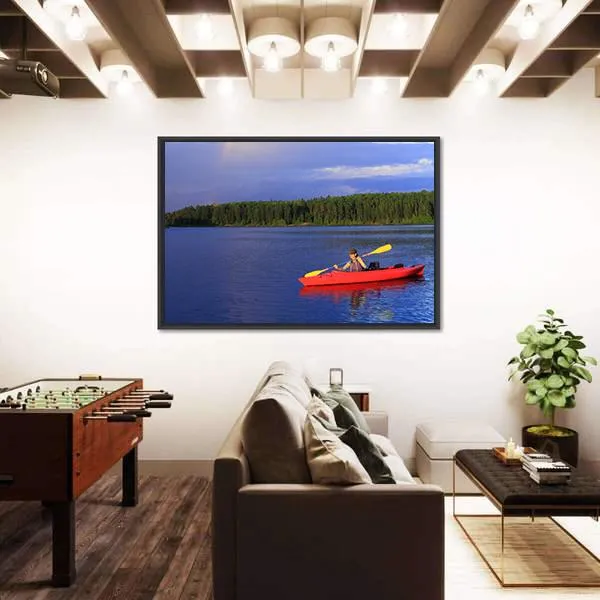 Woman Canoeing In A Beautiful Lake Canvas Wall Art